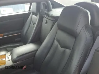 2004 Cadillac XLR z VIN 1G6YV34A945601007, wystawiony jako Copart lot #77077394 z przebiegiem Nie podano mil oraz Szkody całkowita. Historia ofert i sprzedaży dostępna na DreamBid. Obrazek 10.