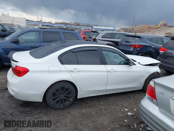 2018 BMW 3 Series 320i xDrive with VIN WBA8E5G52JNU46803, listed as a IAAI auction lot 41869625 with 67,057 mi miles. Bid and sale history available at carsss.com. Image 14.
