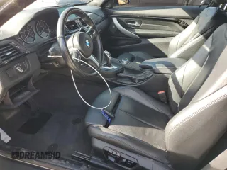 2014 BMW 4 Series 435i xDrive with VIN WBA3R5C59EK187836, listed as a Copart auction lot 63946075 with 100,700 mi miles and Salvage title. Bid and sale history available at DreamBid. Image 7.
