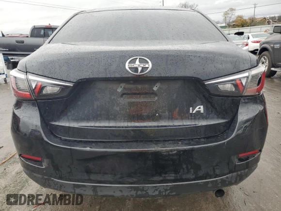 2016 Scion iA z VIN 3MYDLBZV9GY129875, wystawiony jako Copart lot #81368604 z przebiegiem 82 111 mil mil oraz Szkody całkowita. Historia ofert i sprzedaży dostępna na DreamBid. Obrazek 6.