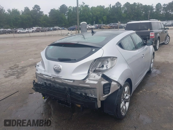 2012 Hyundai Veloster w/Black Int with VIN KMHTC6AD1CU034787, listed as a IAAI auction lot 42607847 with 126,912 mi miles and . Bid and sale history available at DreamBid. Image 6.