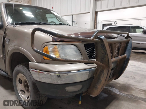 2001 Ford F-150 XL z VIN 1FTRX18W91NB49304, wystawiony jako IAAI lot #42316935 z przebiegiem 258 410 mil mil oraz . Historia ofert i sprzedaży dostępna na DreamBid. Obrazek 6.