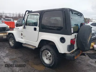 1997 Jeep Wrangler Sahara with VIN 1J4FY49S1VP503639, listed as a IAAI auction lot 41708134 with 102,196 mi miles and . Bid and sale history available at carsss.com. Image 3.