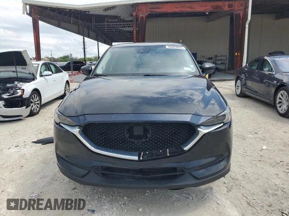 2020 Mazda CX-5 Grand Touring with VIN JM3KFBDM4L0738976, listed as a Copart auction lot 56683955 with 191,650 mi miles and Clean Title. Bid and sale history available at DreamBid. Image 5.