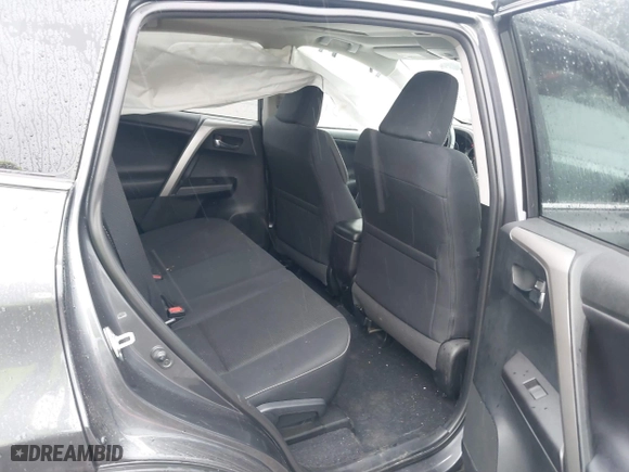2018 Toyota RAV4 XLE with VIN 2T3RFREV5JW798328, listed as a IAAI auction lot 41868104 with 61,076 mi miles. Bid and sale history available at carsss.com. Image 8.