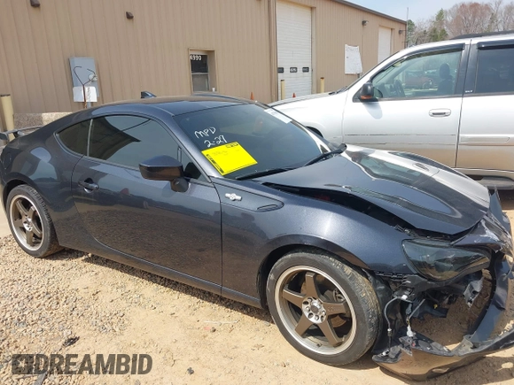 2016 Scion FR-S with VIN JF1ZNAA13G9702833, listed as a IAAI auction lot 41795687 with 71,161 mi miles and . Bid and sale history available at carsss.com. Image 14.