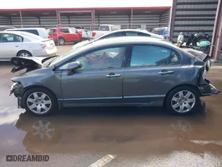 2009 Honda Civic Sdn LX with VIN 2HGFA16569H310017, listed as a IAAI auction lot 41447927 with 258,238 mi miles. Bid and sale history available at carsss.com. Image 14.