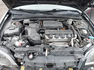 2003 Honda Civic EX with VIN 1HGEM229X3L002571, listed as a IAAI auction lot 41705549 with 134,689 mi miles. Bid and sale history available at carsss.com. Image 10.
