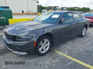 2022 Dodge Charger SXT with VIN 2C3CDXBG4NH248389, listed as a IAAI auction lot 42144728 with 54,132 mi miles and . Bid and sale history available at DreamBid. Image 2.