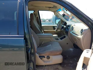 2004 Ford Expedition Special Service with VIN 1FMPU16L74LA64899, listed as a IAAI auction lot 41964679 with 178,369 mi miles. Bid and sale history available at carsss.com. Image 5.