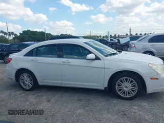 2007 Chrysler Sebring Touring with VIN 1C3LC56K37N533469, listed as a IAAI auction lot 42001566 with 187,698 mi miles and . Bid and sale history available at DreamBid. Image 13.