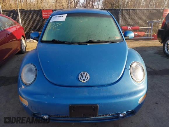 2004 Volkswagen New Beetle Coupe Satellite Blue with VIN 3VWGK31C84M420043, listed as a IAAI auction lot 41871049 with 251,646 mi miles. Bid and sale history available at carsss.com. Image 6.