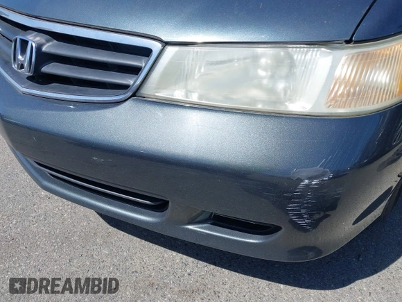 2004 Honda Odyssey EX with VIN 5FNRL18684B027564, listed as a IAAI auction lot 42044126 with 185,627 mi miles and . Bid and sale history available at DreamBid. Image 13.