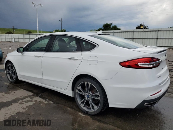 2020 Ford Fusion Titanium with VIN 3FA6P0D96LR175863, listed as a Copart auction lot 60570305 with 76,064 mi miles and Salvage title. Bid and sale history available at DreamBid. Image 2.