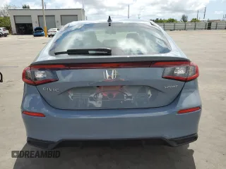 2023 Honda Civic Sport with VIN 19XFL2H88PE000014, listed as a Copart auction lot 55997375 with 28,892 mi miles and Salvage Title. Bid and sale history available at DreamBid. Image 6.