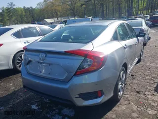 2016 Honda Civic Sedan LX with VIN 19XFC2F53GE051154, listed as a IAAI auction lot 41921524 with 101,979 mi miles. Bid and sale history available at carsss.com. Image 16.