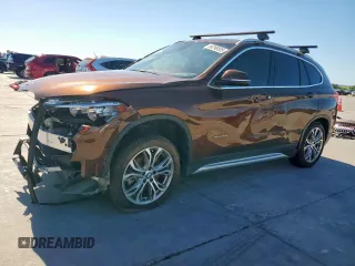 2016 BMW X1 xDrive28i z VIN WBXHT3C38G5E56199, wystawiony jako Copart lot #66298535 z przebiegiem Nie podano mil oraz Szkoda całkowita • Salvage title. Historia ofert i sprzedaży dostępna na DreamBid. Obrazek 1.