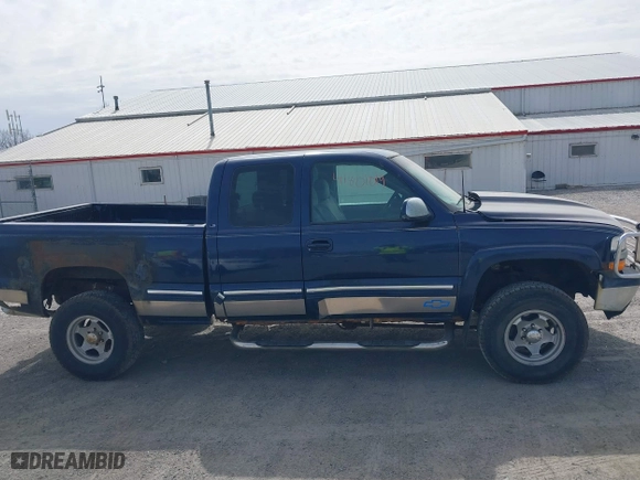 1999 Chevrolet Silverado 1500 LT with VIN 1GCEK19T3XE123498, listed as a IAAI auction lot 41801019 with 213,646 mi miles. Bid and sale history available at carsss.com. Image 14.