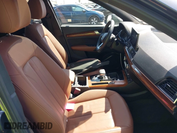 2022 Audi Q5 S line Premium z VIN WA1GAAFY3N2088773, wystawiony jako IAAI lot #41969990 z przebiegiem 22 922 mil mil oraz . Historia ofert i sprzedaży dostępna na DreamBid. Obrazek 5.