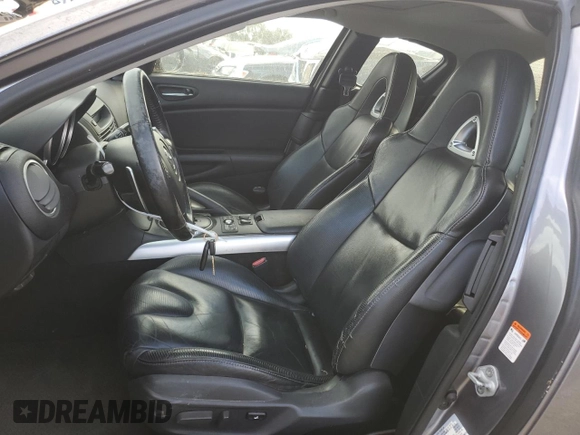 2004 Mazda RX-8 with VIN JM1FE17N240117619, listed as a Copart auction lot 77235454 with 121,887 mi miles and Clean Title. Bid and sale history available at carsss.com. Image 7.