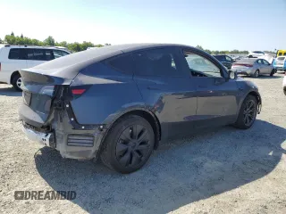 2024 Tesla Model Y Long Range z VIN 7SAYGAEE0RF101971, wystawiony jako Copart lot #58794335 z przebiegiem 16 099 mil mil oraz Szkoda całkowita • Salvage title. Historia ofert i sprzedaży dostępna na DreamBid. Obrazek 3.