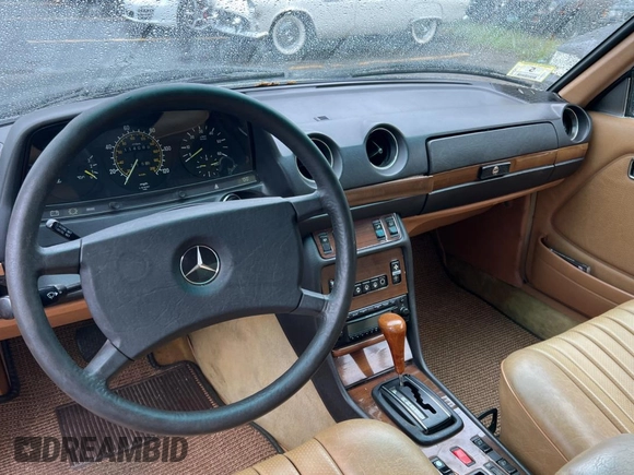 1984 Mercedes-Benz 300 with VIN WDBAB53A5EA022012, listed as a Copart auction lot 56141945 with 114,089 mi miles and Clean Title. Bid and sale history available at DreamBid. Image 9.