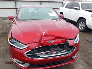 2017 Ford Fusion SE z VIN 3FA6P0H98HR175087, wystawiony jako IAAI lot #41557481 z przebiegiem 103 752 mil mil oraz . Historia ofert i sprzedaży dostępna na DreamBid. Obrazek 12.