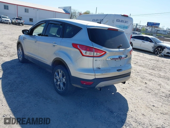 2013 Ford Escape SEL with VIN 1FMCU9H94DUA25017, listed as a IAAI auction lot 41976238 with 171,885 mi miles and . Bid and sale history available at DreamBid. Image 3.