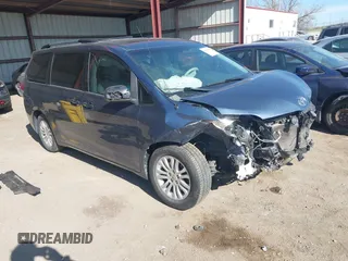 2014 Toyota Sienna XLE with VIN 5TDYK3DC2ES500586, listed as a IAAI auction lot 41995867 with 148,861 mi miles and . Bid and sale history available at DreamBid. Image 1.