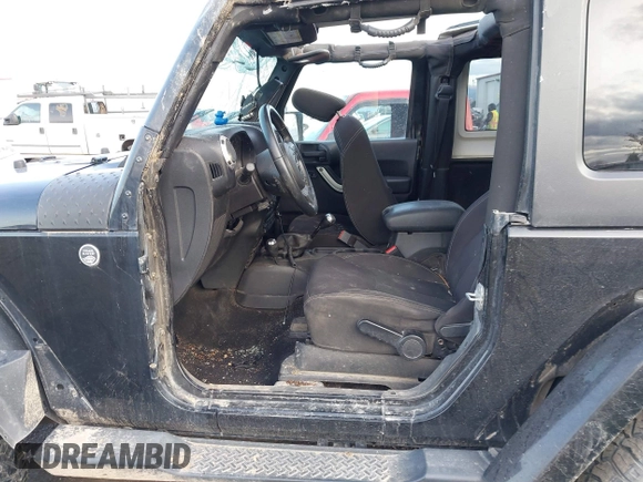 2014 Jeep Wrangler Sahara with VIN 1C4AJWBG5EL247812, listed as a IAAI auction lot 40909884 with 106,475 mi miles and . Bid and sale history available at DreamBid. Image 14.