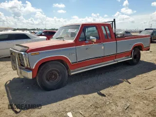 1984 Ford F-250 with VIN 1FTHX2519EKA61287, listed as a Copart auction lot 61553485 with 586,131 mi miles and Salvage title. Bid and sale history available at DreamBid. Image 1.