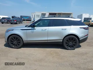 2020 Land Rover Range Rover Velar S z VIN SALYB2EX4LA242330, wystawiony jako IAAI lot #42479335 z przebiegiem 99 712 mil mil oraz . Historia ofert i sprzedaży dostępna na DreamBid. Obrazek 14.