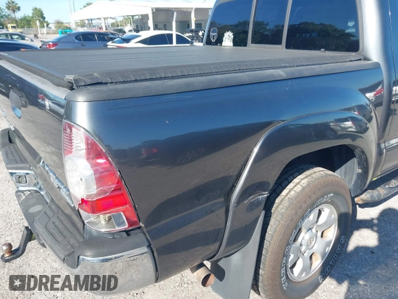 2009 Toyota Tacoma PreRunner with VIN 3TMJU62N59M088137, listed as a IAAI auction lot 41775410 with 217,331 mi miles. Bid and sale history available at carsss.com. Image 6.