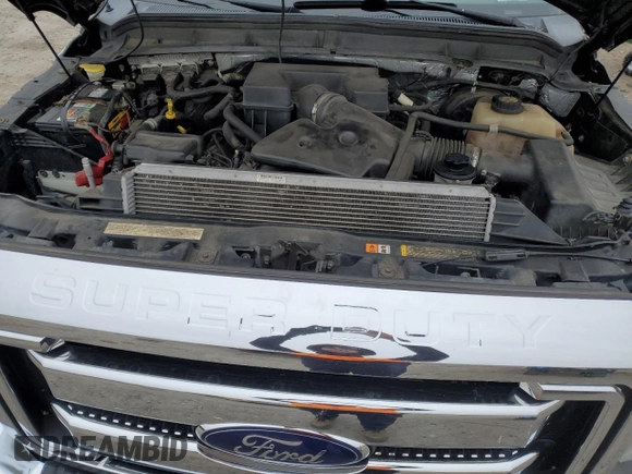 2011 Ford F-250 XL z VIN 1FT7W2B68BEB27949, wystawiony jako Copart lot #88403265 z przebiegiem 162 383 mil mil oraz Szkoda całkowita • Salvage title. Historia ofert i sprzedaży dostępna na DreamBid. Obrazek 13.