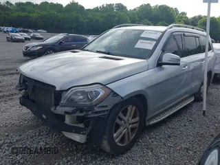 2014 Mercedes-Benz GL 450 z VIN 4JGDF7CE4EA347876, wystawiony jako IAAI lot #42386949 z przebiegiem 133 400 mil mil oraz . Historia ofert i sprzedaży dostępna na DreamBid. Obrazek 16.
