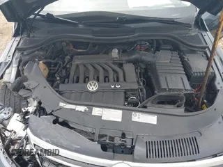 2013 Volkswagen CC Executive z VIN WVWGU7AN8DE520610, wystawiony jako IAAI lot #42278719 z przebiegiem 197 905 mil mil oraz . Historia ofert i sprzedaży dostępna na DreamBid. Obrazek 10.