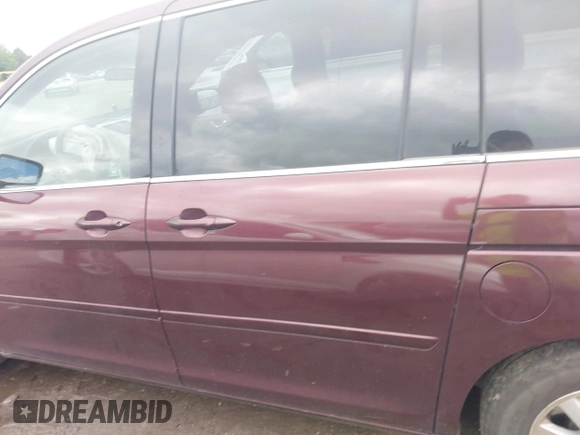 2010 Honda Odyssey EX with VIN 5FNRL3H45AB044845, listed as a IAAI auction lot 42353739 with 289,376 mi miles and . Bid and sale history available at DreamBid. Image 14.