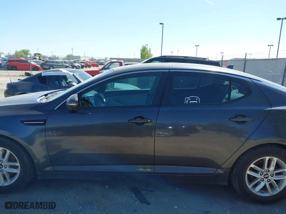 2011 Kia Optima LX with VIN KNAGM4A78B5066644, listed as a IAAI auction lot 42011172 with 172,862 mi miles. Bid and sale history available at carsss.com. Image 6.