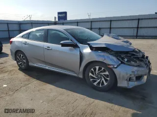 2016 Honda Civic Sedan EX with VIN 19XFC2F75GE232841, listed as a Copart auction lot 52128065 with 55,560 mi miles and Salvage Title. Bid and sale history available at carsss.com. Image 4.