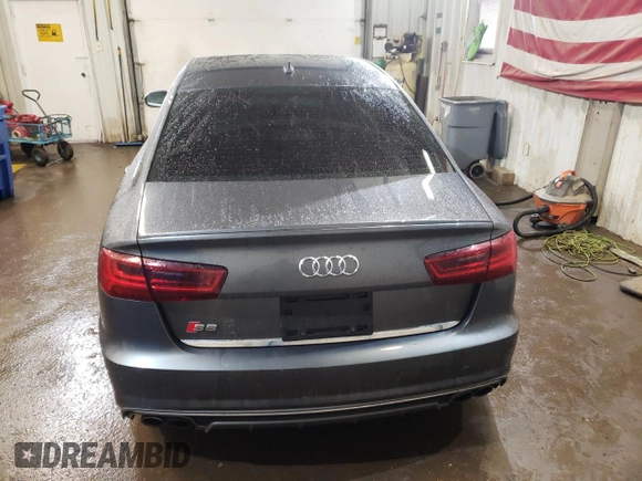 2016 Audi S6 Premium Plus z VIN WAUF2AFC4GN100284, wystawiony jako Copart lot #86496964 z przebiegiem 100 537 mil mil oraz Szkody całkowita. Historia ofert i sprzedaży dostępna na DreamBid. Obrazek 6.