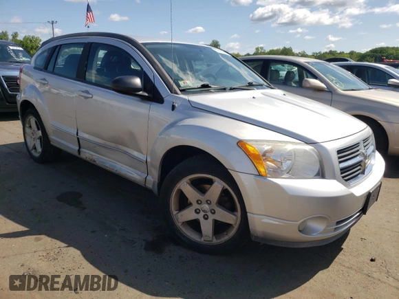 2009 Dodge Caliber R/T z VIN 1B3HB78B49D168677, wystawiony jako Copart lot #58051655 z przebiegiem 104 860 mil mil oraz Szkoda całkowita • Salvage title. Historia ofert i sprzedaży dostępna na DreamBid. Obrazek 4.