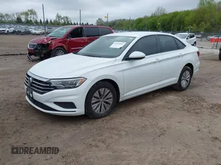 2019 Volkswagen Jetta S with VIN 3VWC57BUXKM059741, listed as a IAAI auction lot 42189565 with 127,972 mi miles and . Bid and sale history available at DreamBid. Image 2.