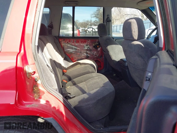 1996 Jeep Grand Cherokee Laredo with VIN 1J4GZ58Y8TC374929, listed as a IAAI auction lot 41725111 with 196,723 mi miles. Bid and sale history available at carsss.com. Image 8.