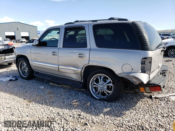 2004 GMC Yukon SLT with VIN 1GKEK13Z04J140148, listed as a Copart auction lot 52411494 with 167,629 mi miles and Salvage Title. Bid and sale history available at carsss.com. Image 2.