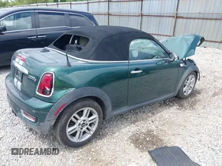2013 MINI Roadster S z VIN WMWSY3C55DT566134, wystawiony jako IAAI lot #42265800 z przebiegiem Nie podano mil oraz . Historia ofert i sprzedaży dostępna na DreamBid. Obrazek 4.