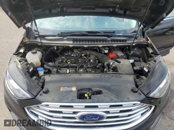 2019 Ford Edge SEL with VIN 2FMPK4J93KBC26513, listed as a Copart auction lot 59301295 with 58,364 mi miles and Salvage title. Bid and sale history available at DreamBid. Image 12.