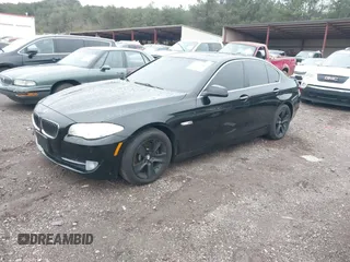 2013 BMW 5 Series 528i with VIN WBAXG5C54DD231297, listed as a IAAI auction lot 41209069 with 79,878 mi miles and . Bid and sale history available at carsss.com. Image 2.