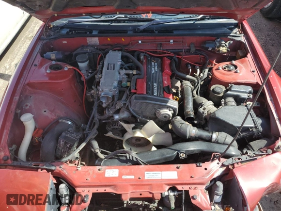 1989 Nissan 240SX z VIN RS13604765, wystawiony jako Copart lot #46514985 z przebiegiem 115 929 mil mil oraz Szkoda całkowita • Salvage title. Historia ofert i sprzedaży dostępna na DreamBid. Obrazek 11.