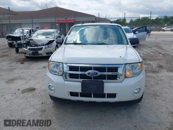 2012 Ford Escape XLT z VIN 1FMCU9DG2CKB18584, wystawiony jako IAAI lot #42469881 z przebiegiem 166 469 mil mil oraz . Historia ofert i sprzedaży dostępna na DreamBid. Obrazek 12.