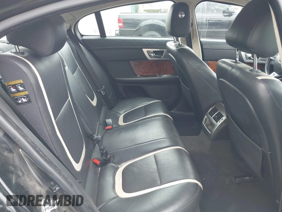 2015 Jaguar XF V6 Portfolio with VIN SAJWA0F77F8U65737, listed as a IAAI auction lot 42078529 with 62,229 mi miles. Bid and sale history available at carsss.com. Image 8.